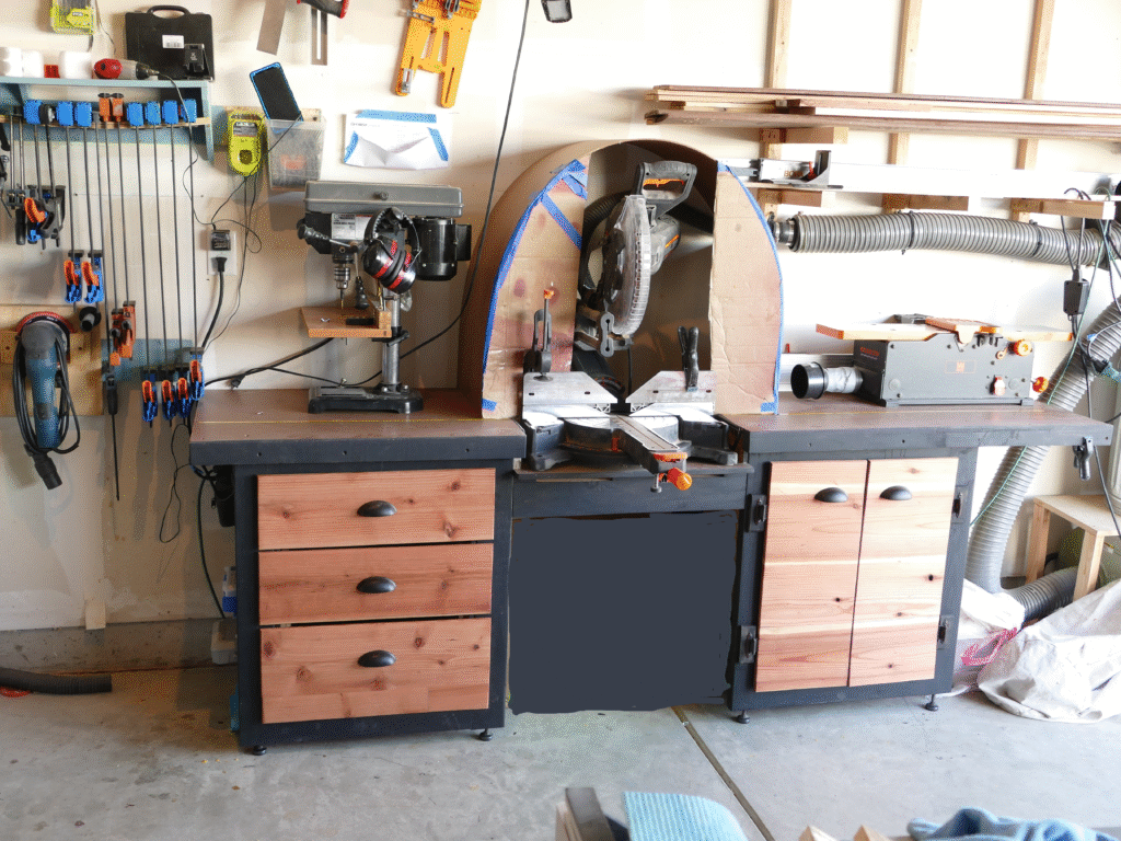 Miter saw station with a stand drill next to it on a workbench